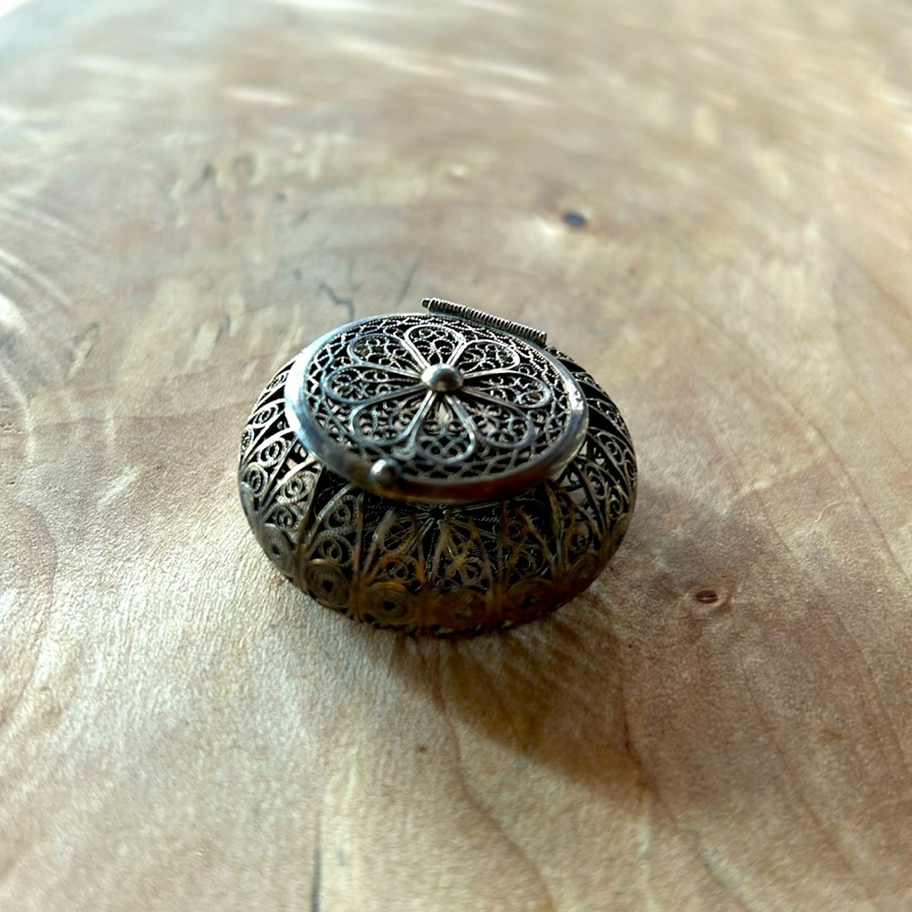 Vintage sterling filigree pill box.